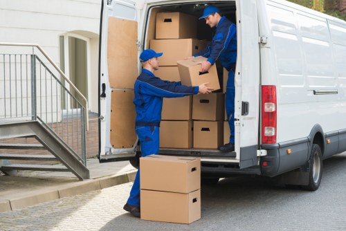 Local house removalists planning a move in Archway with furniture and boxes