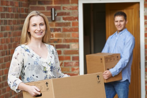 Van and mover handling a local office move near Archway