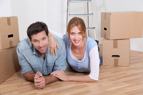 Removal van and movers handling a residential move in Archway