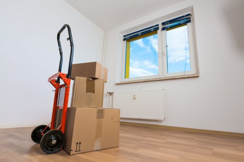 Movers handling furniture for a short-notice relocation