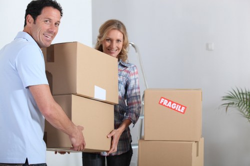 Packed office furniture and boxes prepared for transport in North London